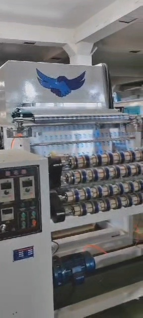 خط تولید اتوماتیک جامبو رول نوار چسب شیشه‌ای